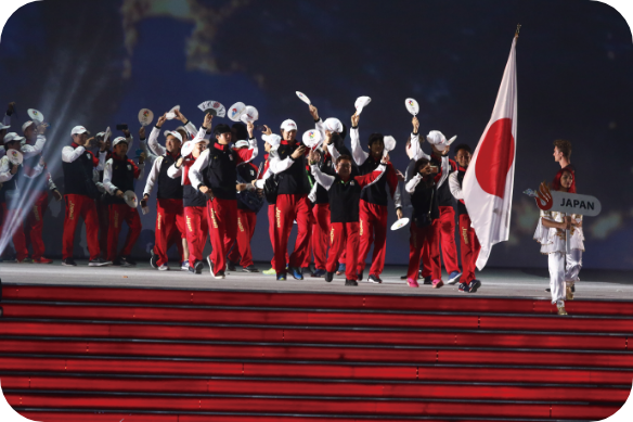 Photo of the Japanese team holding the national flag