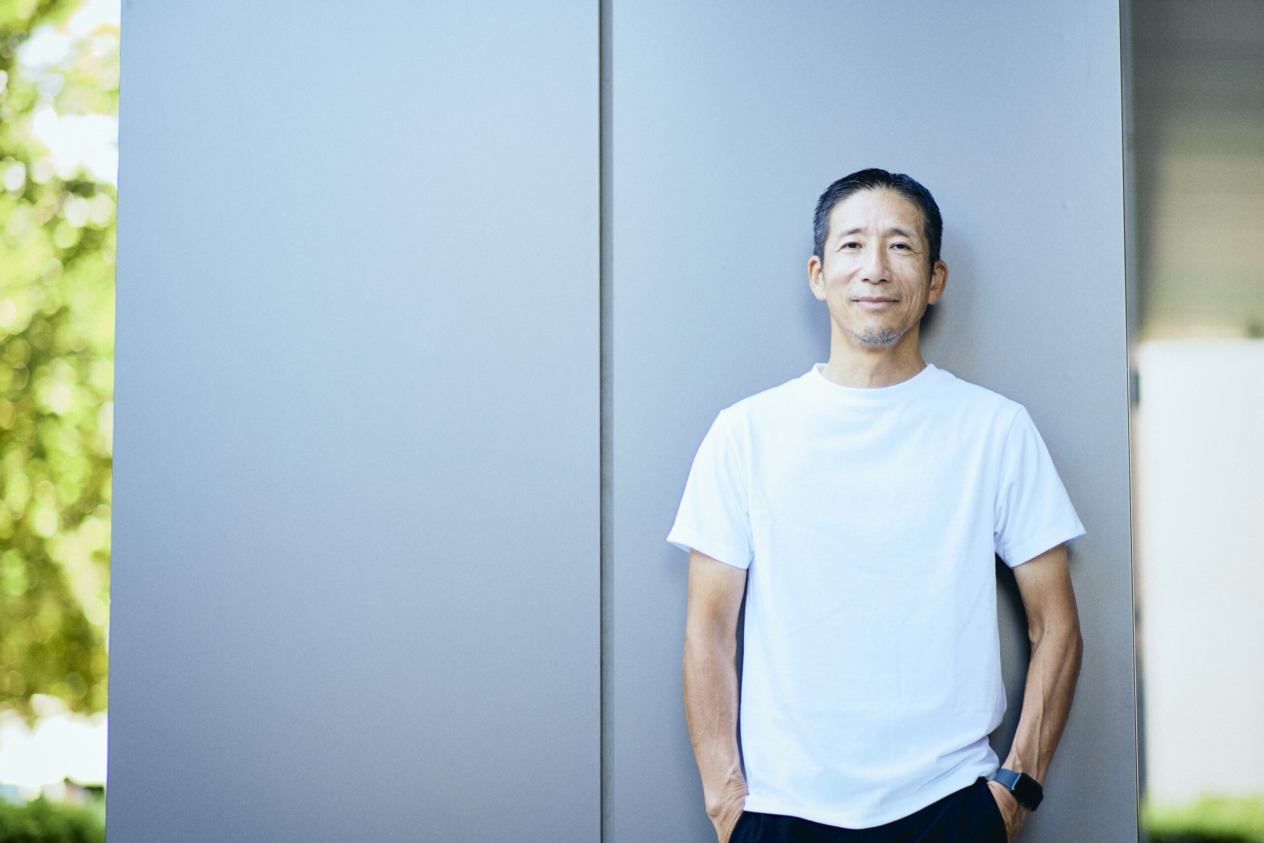 The photo of Nakagawa who was taken a photo in front of the pillar of National Stadium