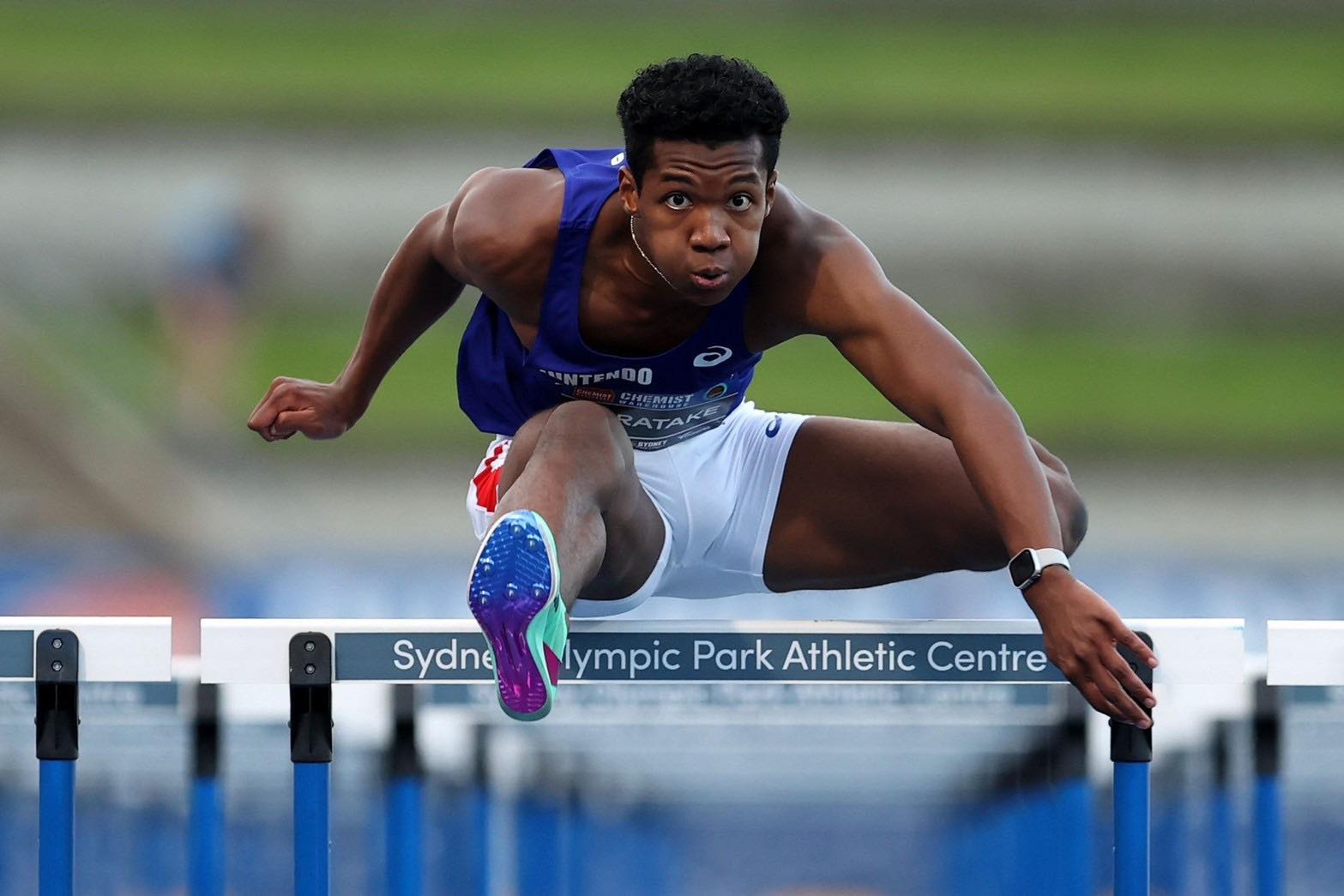 The photo of Muratake jumping hurdles